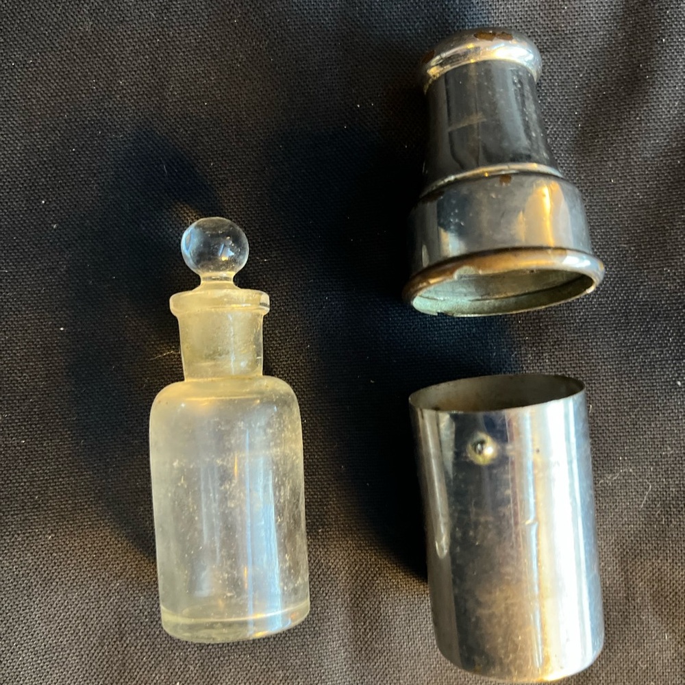 Silver and Gold Metal Cylinder